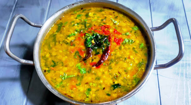 Indian popular food Dal fry or traditional Dal Tadka Curry served in pan